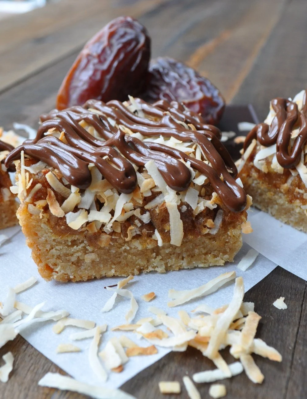 Homemade Samoa Bars with chocolate, caramel, and coconut layers