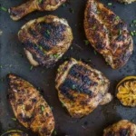 Perfectly grilled skin-on chicken on the grill for a delicious meal