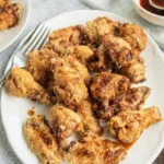 Deliciously crispy and flavorful Korean Fried Chicken served with sauces