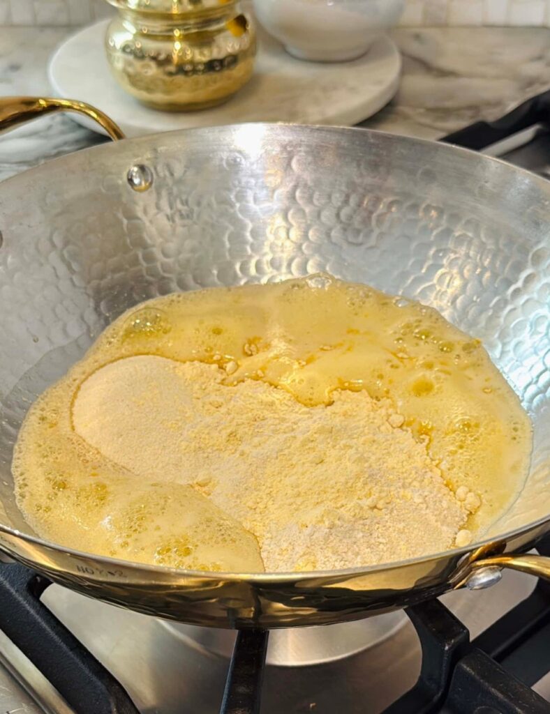 Cooking with bubbling yellow mixture