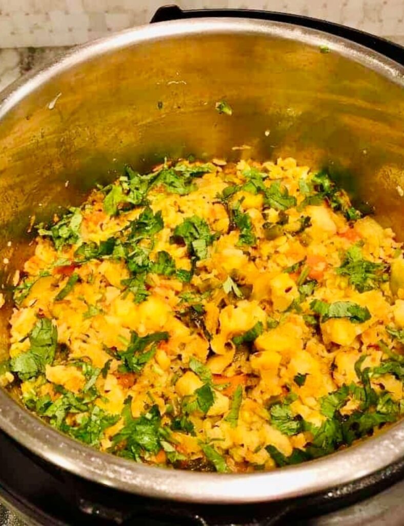 Cooked vegetable dish with herbs