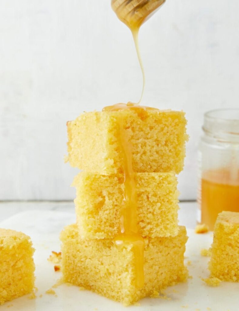 Flavorful buttermilk cornbread served warm with butter.
