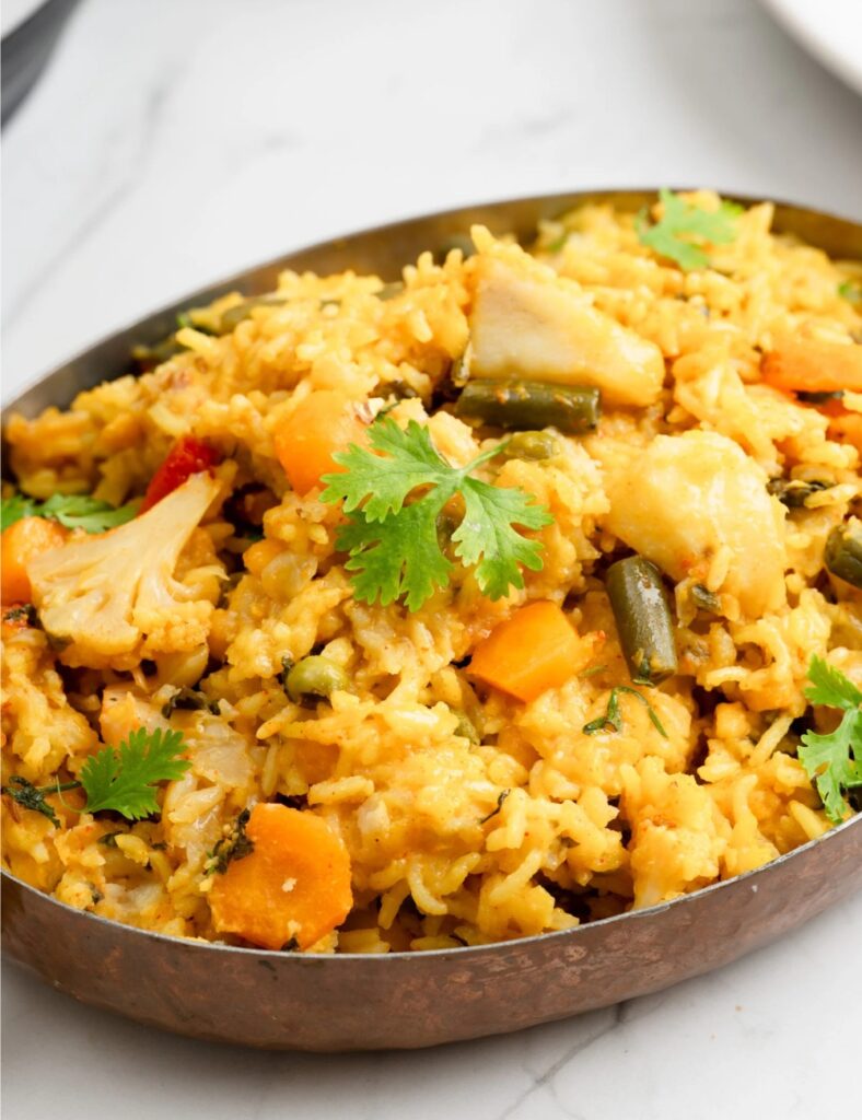 Colorful vegetable rice dish with herbs