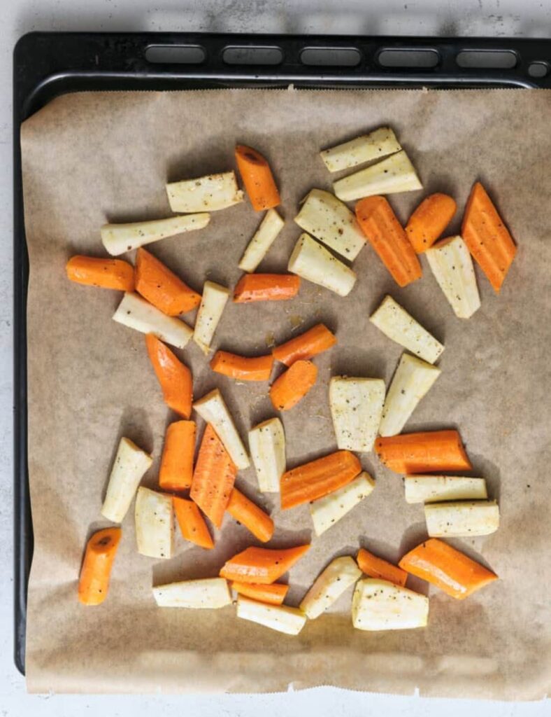 Pop the baking sheet into the preheated oven and roast for 25-30 minutes. Make sure to stir halfway through the cooking time to ensure even roasting. They should come out tender and golden brown.