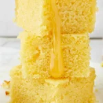Flavorful buttermilk cornbread served warm with butter.